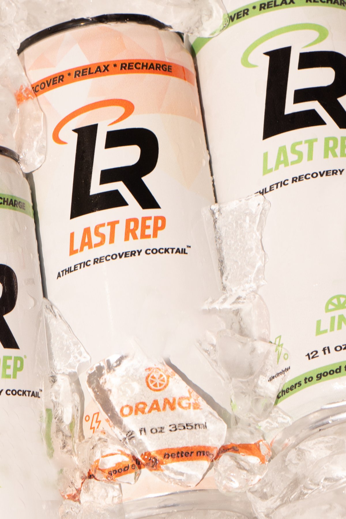 Last Rep Orange and Lime cans chilling in ice